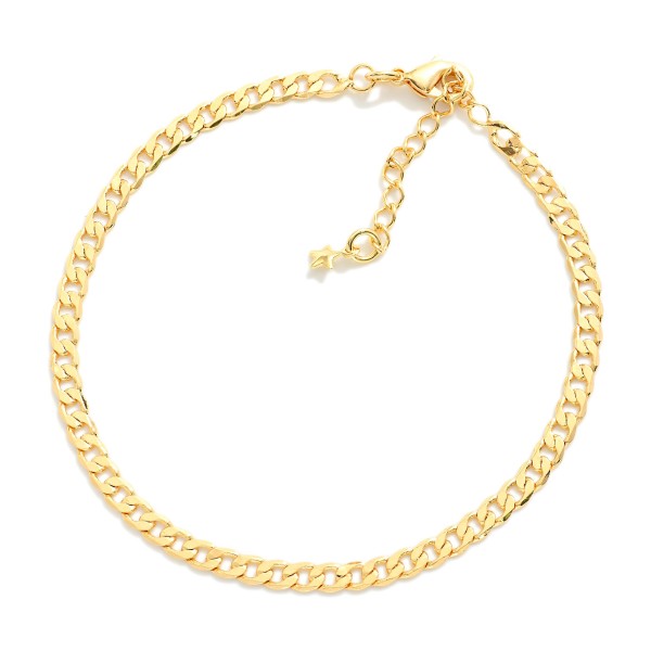 Gold Tone Flat Chain Link Bracelet

- Approximately 7" L
- Extender 2" L
- 18k Gold Filled
- Hypoallergenic
- Made In Brazil