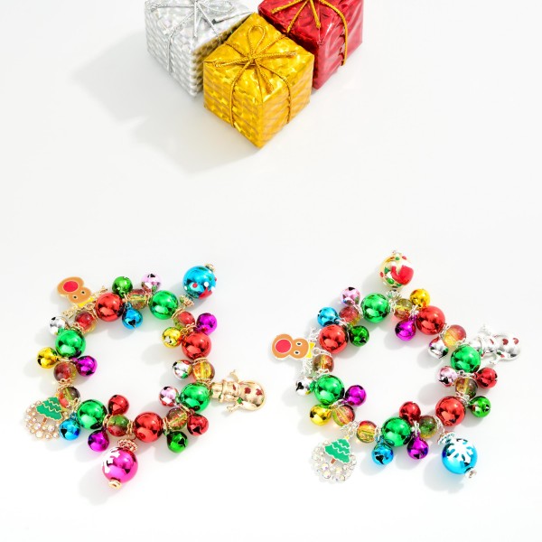 Metallic Bead Beaded Stretch Bracelet Featuring Jingle Bells & Metal Tone Christmas Charms 

- Approximately 3" D 