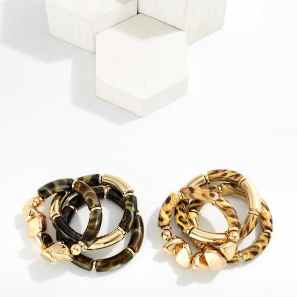 Set Of Three Marble Resin Stretch Bracelet Featuring Gold Accents
- Approximately 4" D