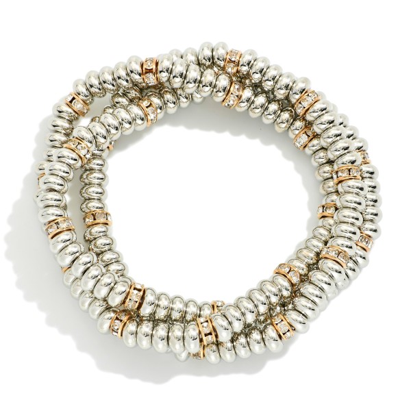 Set Of Three Metal Tone Disk Bead Stretch Bracelets Featuring Rhinestone Details 

- Approximately 2.5" D 


