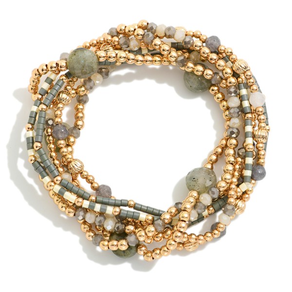 Set Of Seven Beaded Stretch Bracelets Featuring Metal Tone , Stone, & Seed Beads

- Approximately 3" D
