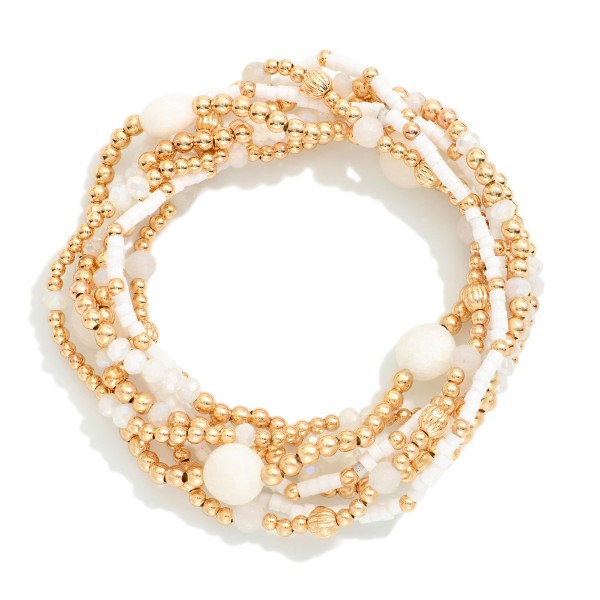Set Of Seven Beaded Stretch Bracelets Featuring Metal Tone , Stone, & Seed Beads

- Approximately 3" D
