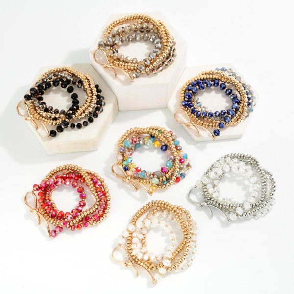 Set Of Five Beaded Stretch Bracelets Featuring Faceted Beads, Metal Tones, & Knotted Metal Detail 

- Approximately 2.5" D