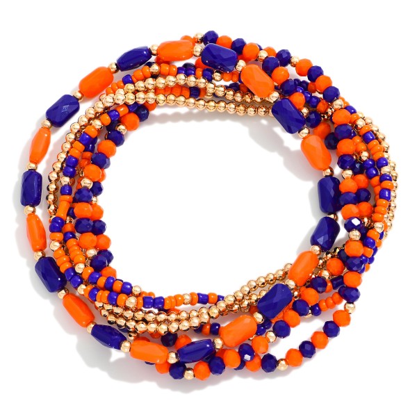 Set Of Seven Metal Tone Mix Beaded Stretch Bracelet Featuring Gold Tones 

- Approximately 3" L