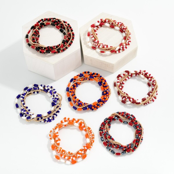 Set Of Seven Metal Tone Mix Beaded Stretch Bracelet Featuring Gold Tones 

- Approximately 3" L