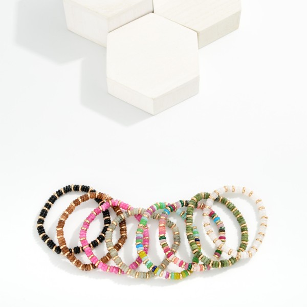 Beaded Stretch Bracelets Featuring Flatted Gold Tone Beads & Disc Beads

- Approximately 3" D

