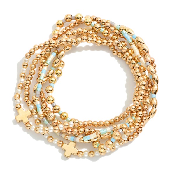 Set Of Six Beaded Stretch Bracelets Featuring Metal Tones, Heishi Beads, & Plus Crosses 

- Approximately 2.5" D