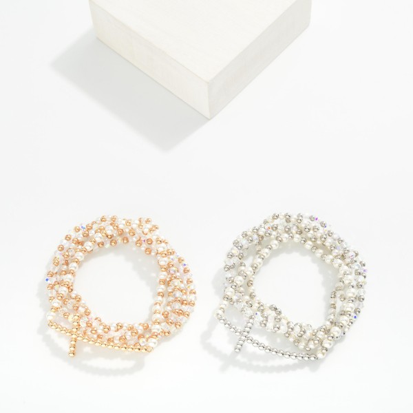 Set Of Five Beaded Stretch Bracelets Featuring Pearls, Faceted Beads, & Metal Tone East West Bubble Cross 

- Approximately 2.5" D