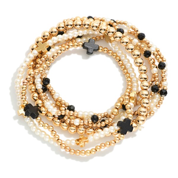 Set Of Seven Gold Tone Beaded Bracelet Featuring Criss Cross Bead And Pearls 

- Approximately 2.5" D 