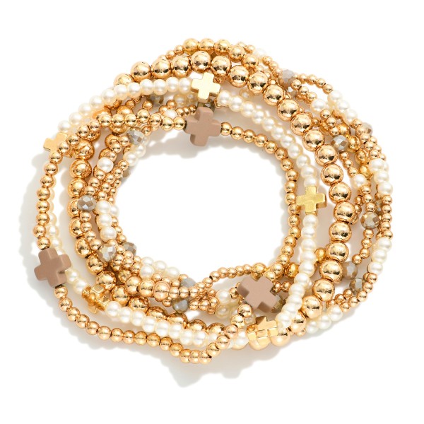 Set Of Seven Gold Tone Beaded Bracelet Featuring Criss Cross Bead And Pearls 

- Approximately 2.5" D 