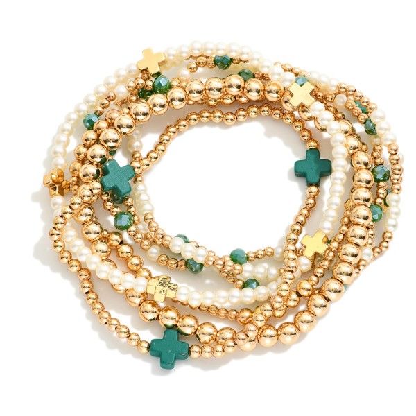 Set Of Seven Gold Tone Beaded Bracelet Featuring Criss Cross Bead And Pearls 

- Approximately 2.5" D 