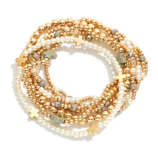 Set Of Seven Gold Tone Beaded Bracelet Featuring Criss Cross Bead And Pearls 

- Approximately 2.5" D 