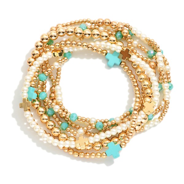 Set Of Seven Gold Tone Beaded Bracelet Featuring Criss Cross Bead And Pearls 

- Approximately 2.5" D 