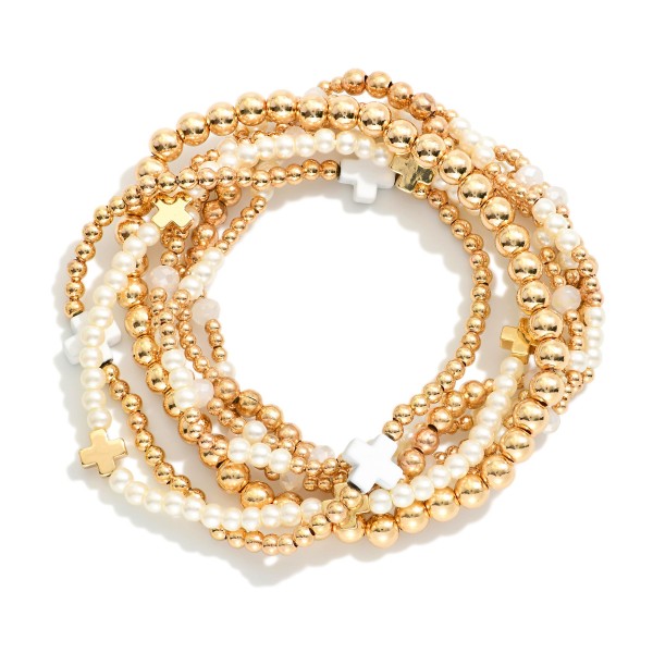 Set Of Seven Gold Tone Beaded Bracelet Featuring Criss Cross Bead And Pearls 

- Approximately 2.5" D 