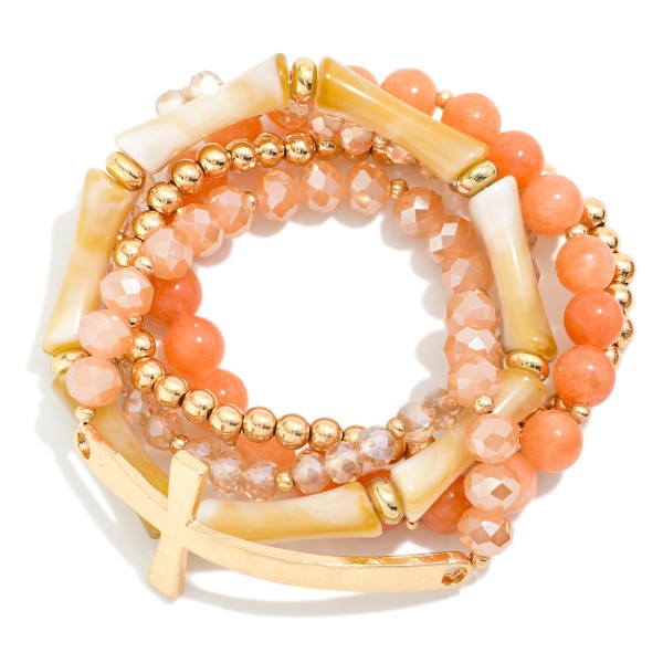 Set Of Five Beaded Stretch Bracelets Featuring Stone Beads & Metal Tone East West Cross

- Approximately 2.75" D
