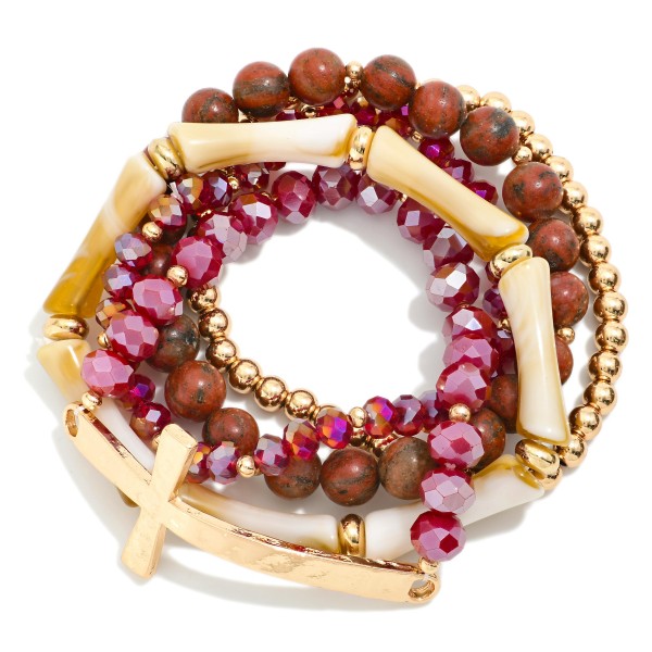 Set Of Five Beaded Stretch Bracelets Featuring Stone Beads & Metal Tone East West Cross

- Approximately 2.75" D