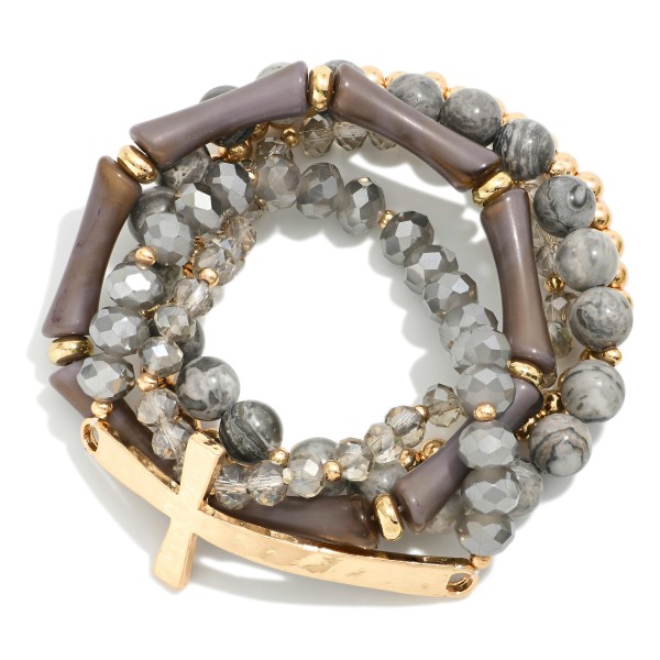 Set Of Five Beaded Stretch Bracelets Featuring Stone Beads & Metal Tone East West Cross

- Approximately 2.75" D