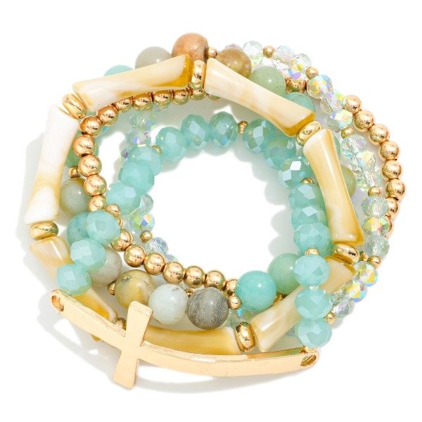 Set Of Five Beaded Stretch Bracelets Featuring Stone Beads & Metal Tone East West Cross

- Approximately 2.75" D