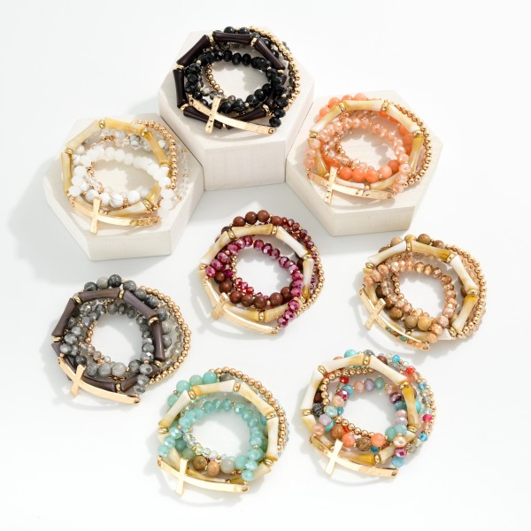 Set Of Five Beaded Stretch Bracelets Featuring Stone Beads & Metal Tone East West Cross

- Approximately 2.75" D
