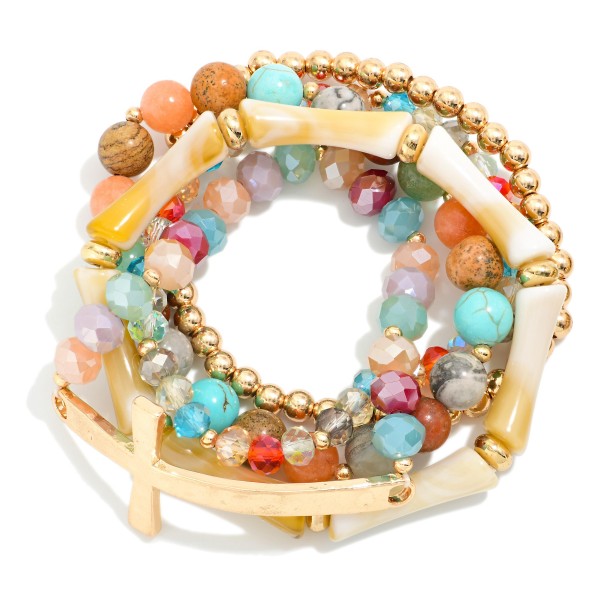 Set Of Five Beaded Stretch Bracelets Featuring Stone Beads & Metal Tone East West Cross

- Approximately 2.75" D