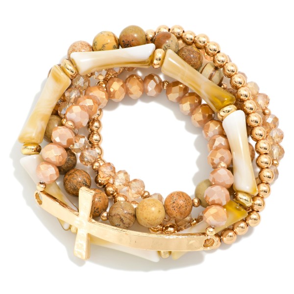 Set Of Five Beaded Stretch Bracelets Featuring Stone Beads & Metal Tone East West Cross

- Approximately 2.75" D