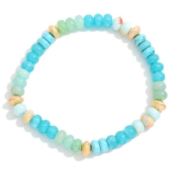 Stone Beaded Stretch Bracelet Featuring Gold Tone Textured Beaded Stations

- Approximately 2.25" D

