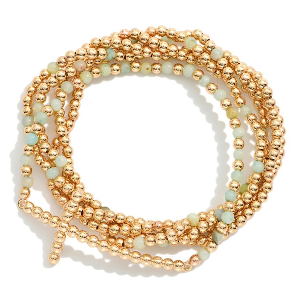 Set Of Five Beaded Stretch Bracelets Featuring Stone, Metal Tones, & Bubble East West Cross 

- Approximately 2.5" D