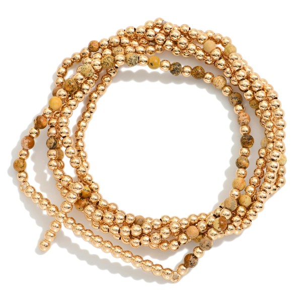 Set Of Five Beaded Stretch Bracelets Featuring Stone, Metal Tones, & Bubble East West Cross 
- Approximately 2.5" D