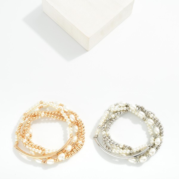 Set OF Five Pearl & Metal Tone Beaded Stretch Bracelet Featuring Metal Tube

- Approximately 3" L


