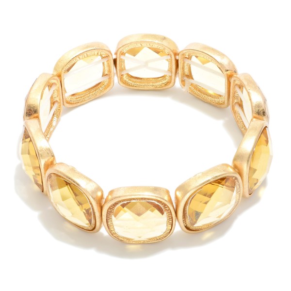 Metal Tone Stretch Bangle Bracelet Featuring Glass Crystal Accent  

- Approximately 2.75" D