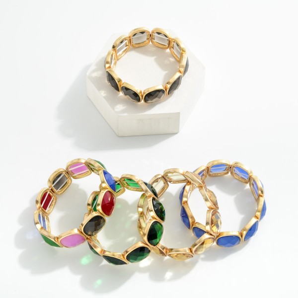 Metal Tone Stretch Bangle Bracelet Featuring Glass Crystal Accent  

- Approximately 2.75" D