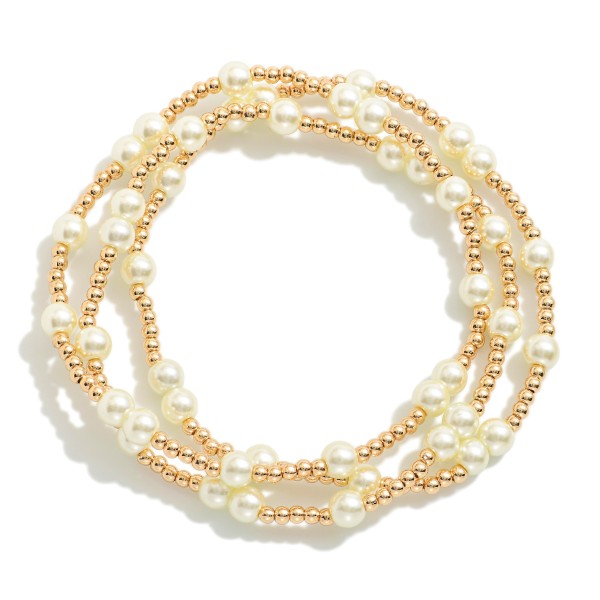 Set Of Three Pearl Beaded Stretch Bracelets With Metal Bead Accents 

- Approximately 3" D