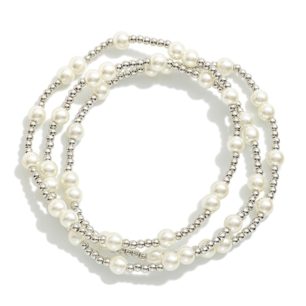 Set Of Three Pearl Beaded Stretch Bracelets With Metal Bead Accents 

- Approximately 3" D