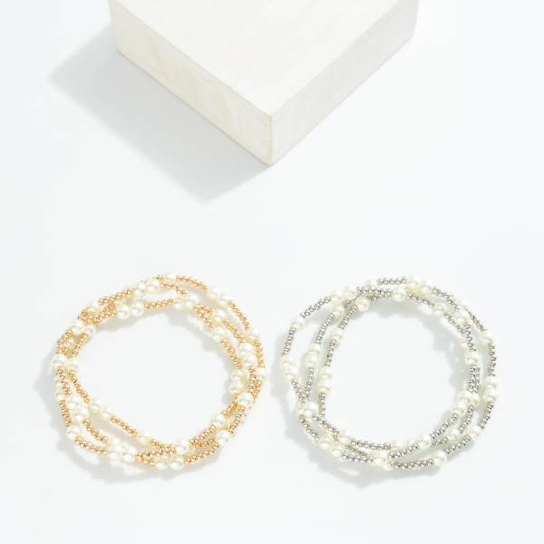 Set Of Three Pearl Beaded Stretch Bracelets With Metal Bead Accents 

- Approximately 3" D