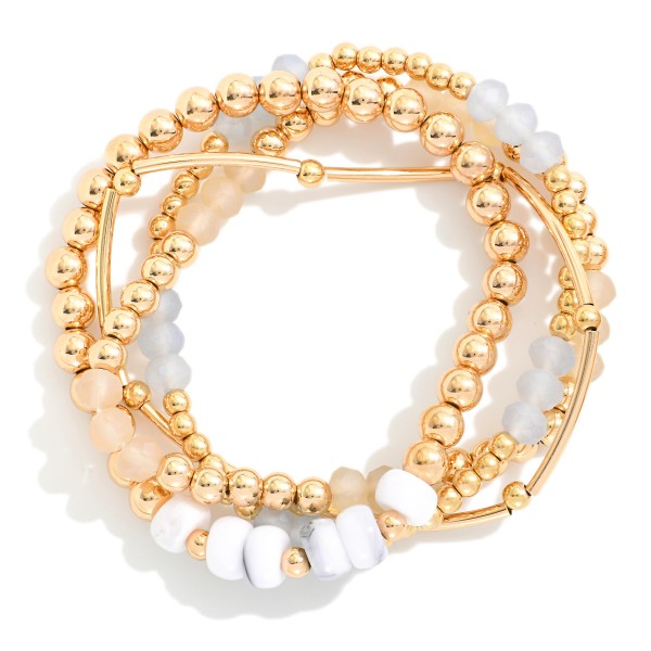Set Of Four Beaded Stretch Bracelet Featuring Gold Tones, Bar Beads, Stone Beads , & Faceted Beads  

- Approximately 2.5"D 