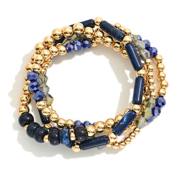 Set Of Four Beaded Stretch Bracelets Featuring Stone Beads And Gold Tones 

- Approximately 2.75 "D 