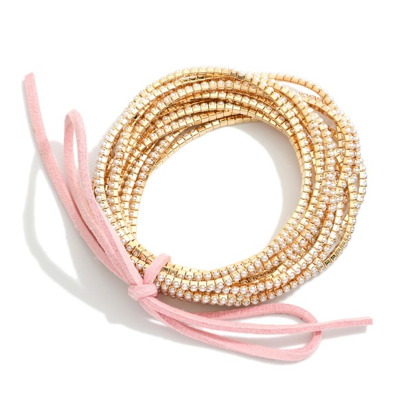 Set Of 12 Rhinestone Beaded Stretch Bracelets With Vegan Leather Bow Detail 

- Approximately 2.5" D