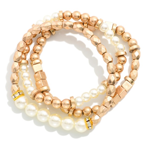 Set Of Three Metal Tone Bead Stretch Bracelets Featuring Pearls 

- Approximately 2.5" D

