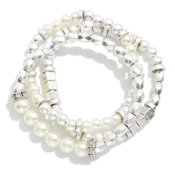 Set Of Three Metal Tone Bead Stretch Bracelets Featuring Pearls 

- Approximately 2.5" D

