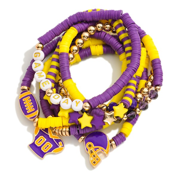 Set Of Seven "Game Day" Heishi Beaded Bracelet Featuring Charms, Gold Tones, And Faceted Beads 

- Approximately 3.5" D 