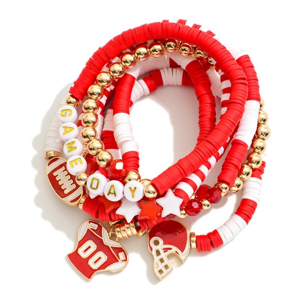 Set Of Seven "Game Day" Heishi Beaded Bracelet Featuring Charms, Gold Tones, And Faceted Beads 

- Approximately 3.5" D 