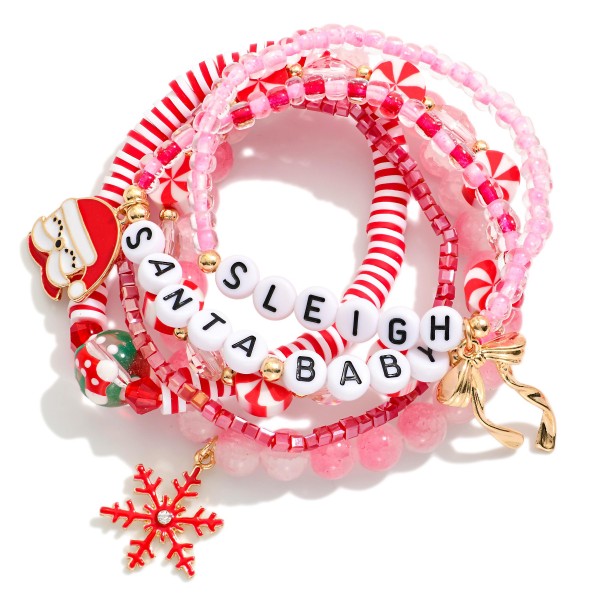 Set Of Six Mixed Bead Christmas Themed Bracelet Featuring "Santa Baby" & "Sleigh" Beads, Charismas Charms, And Gold Tones 

- Approximately 3.25" D 