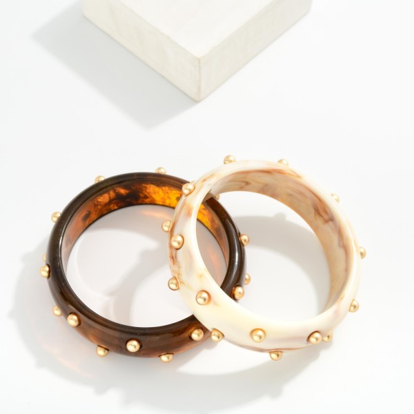 Resin Acetate Bangle Bracelet With Gold Tone Stud Accents

- Approximately 2.5" D

