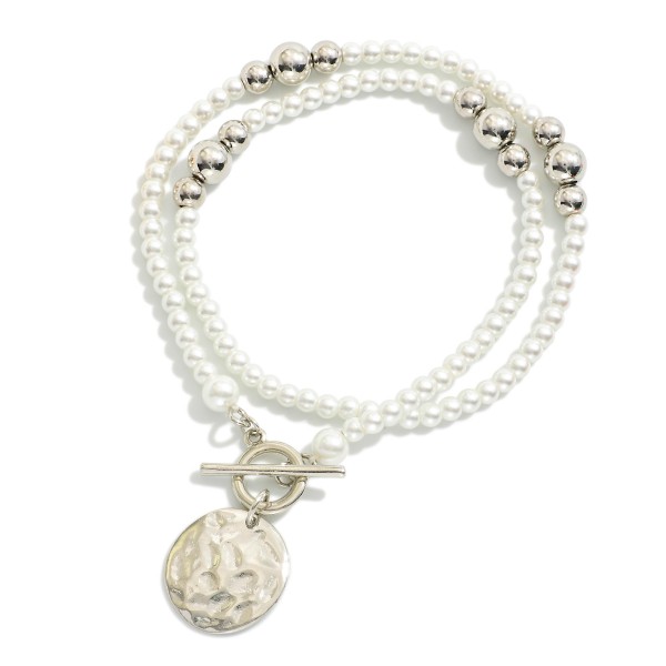 Pearl & Metal Tone Bead Beaded Necklace Featuring Toggle Clasp & Hammered Metal Circle Pendant

- Approximately 18" L
