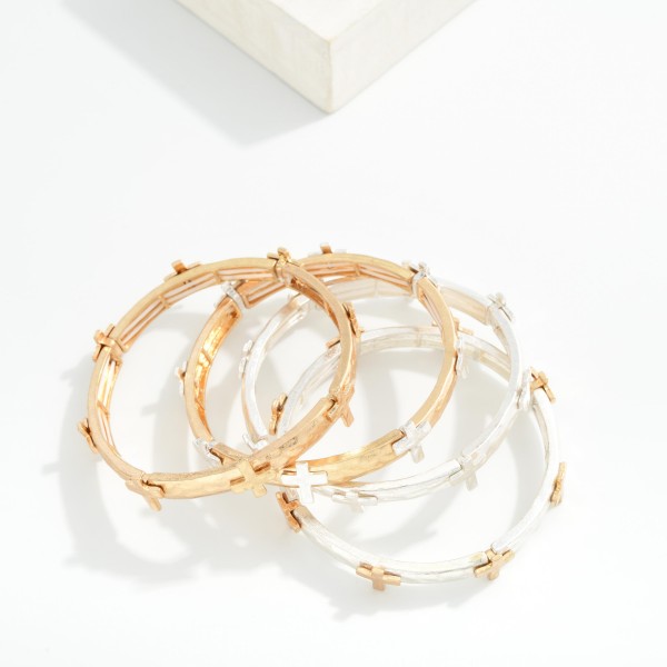 Metal Tone Stretch Bangle Bracelet Featuring Cross Station 

- Approximately 2.75" D 