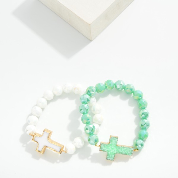Glass Crystal Beaded Stretch Bracelet Featuring Crystal Cross Pendent 

- Approximately 2.75" D 