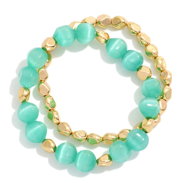 Set Of Two Beaded Stretch Bracelet Featuring Metal Tones & Glass Beads 

- Approximately 3" D 