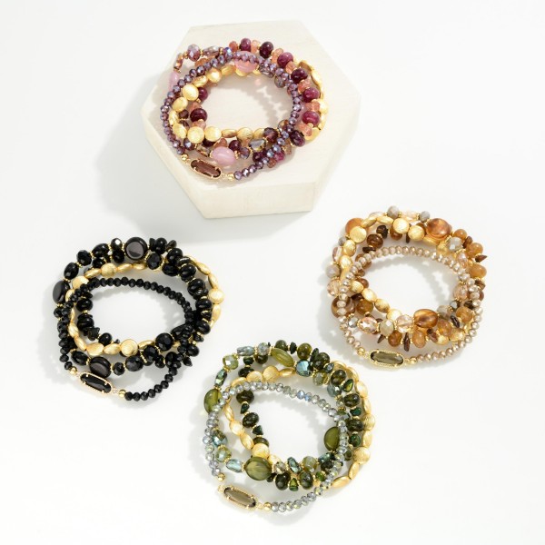 Set Of Four Beaded Stretch Bracelets Featuring Gold Tones, Stone, & Glass Crystal 

- Approximately 3" D 