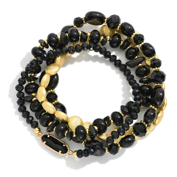 Set Of Four Beaded Stretch Bracelets Featuring Gold Tones, Stone, & Glass Crystal 

- Approximately 3" D 
