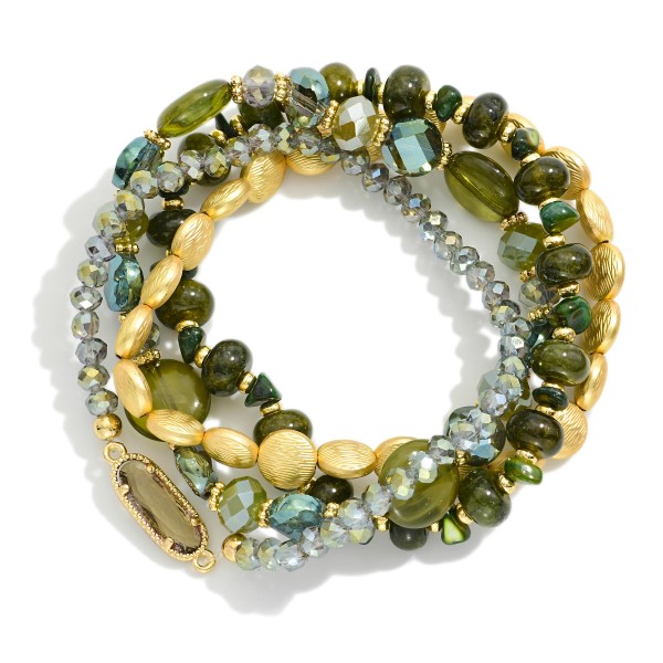 Set Of Four Beaded Stretch Bracelets Featuring Gold Tones, Stone, & Glass Crystal 

- Approximately 3" D 